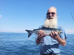 Angler fishing in MI with one fish