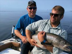 Two people fishing in MI