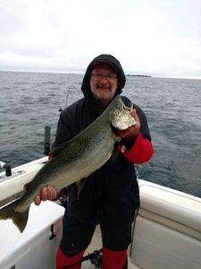 Angler holding a 21-inch fish at location 60096