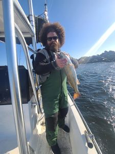 Angler with a 15-inch fish caught while fishing in Panama City Beach