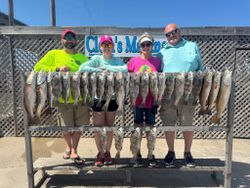 Anglers with a bountiful catch of redfish and black drum in Corpus Christi