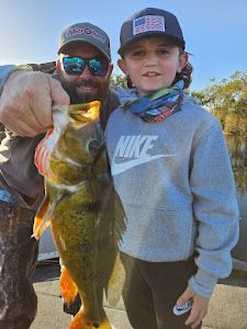 Two anglers enjoying a fishing trip in South Bay