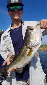 Fisherman holding 19-inch catch in Florida