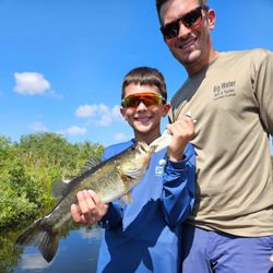 Two people fishing in South Bay