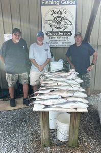 2 people fishing in GA with fishing and tours equipment