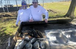 Fresh caught fish displayed on outdoor cleaning station in Emory TX