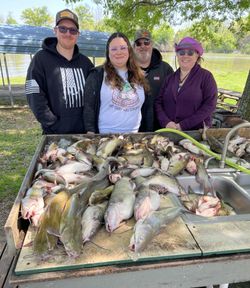 4 people fishing at Emory