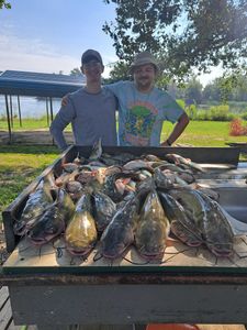Two people enjoying fishing in TX