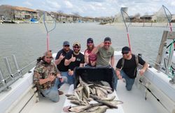 Group of 6 people fishing in Port Clinton
