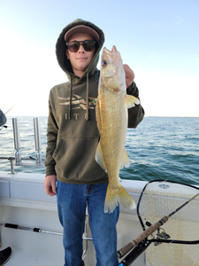 A person fishing in Port Clinton
