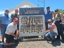 Group of 6 people fishing in Port Clinton