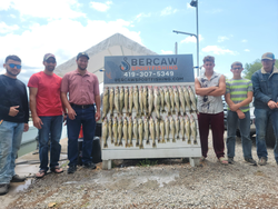 Group of 6 people fishing in Port Clinton