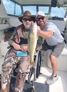 Two people fishing at Port Clinton