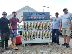 Four people fishing at Port Clinton