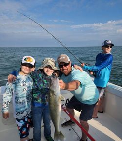 Four people fishing in Port Clinton