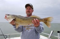 Angler with pike-perch catch in OH