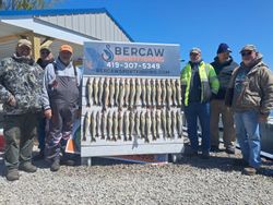 Large display of freshly caught fish arranged on cleaning station at Port Clinton OH fishing charter