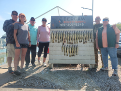 6 people fishing in Port Clinton