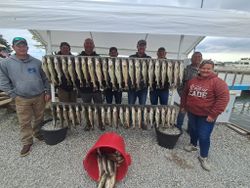 Group of 8 people enjoying a fishing trip in Port Clinton