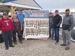 Fishing charter display board showing large catch of walleye at Port Clinton OH marina