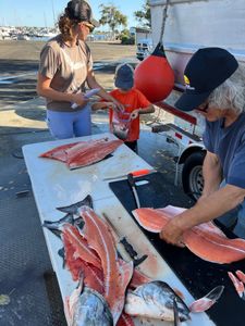 Two people enjoying a fishing trip in CA