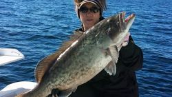 Angler with a large fish caught in Carrabelle