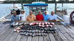 Six friends enjoying a fishing trip in FL