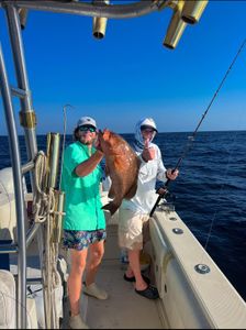 Anglers with a big fish in Florida