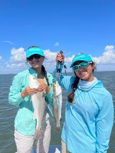Two redfish caught by anglers in TX