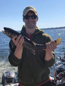 A person fishing in Vermont
