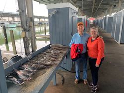 Three people enjoying a fishing trip in TX