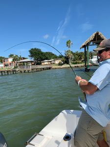 Two people fishing in Galveston