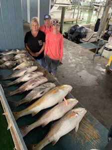Two fishermen with big fish caught in TX