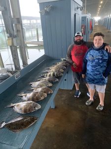 Three European flounder and Sheepshead fish caught in Galveston