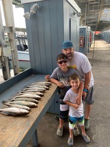 Trio of anglers fishing in Galveston