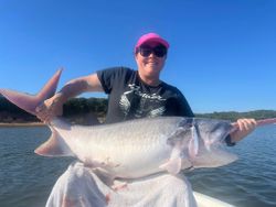 A lone angler fishing in the waters of OK