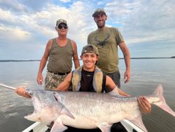 Three people enjoying a fishing day at Sand Springs