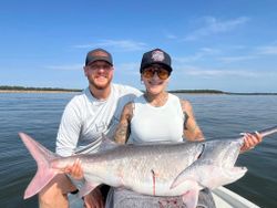 Two anglers fishing in the OK area