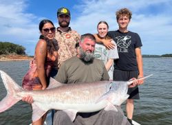 Group of 5 people fishing at Sand Springs location