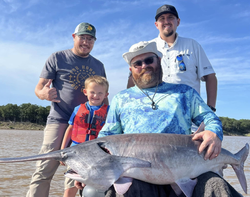 A group of 4 people fishing at Sand Springs