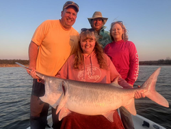 A group of 4 people fishing in OK
