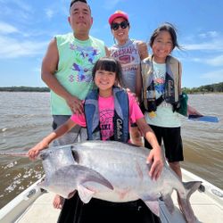 Four people fishing in OK location