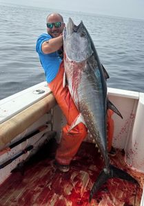 1 Fisherman reeling in a 52-inch catch in Red Bank