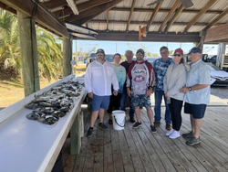 Group of 7 people fishing in MS