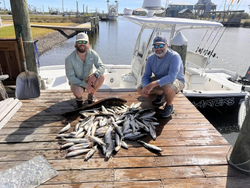 Two people fishing in MS