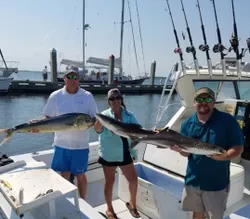 Two cobia, a 30-inch big fish, caught while fishing in Fernandina Beach
