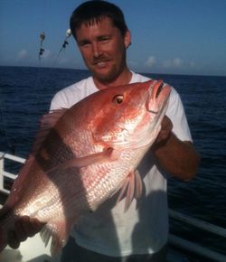A lone angler fishing at Fernandina Beach