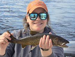 Angler with their catch of a 15-inch fish in Maine