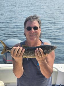 A person fishing in Maine