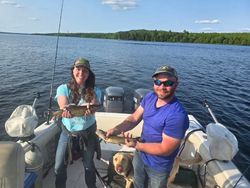 Three people fishing in Maine
